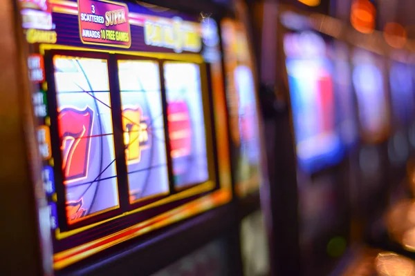 Live match feed on mobile Mobile phone displaying Free Fire World Series live match feed and r88slot betting interface